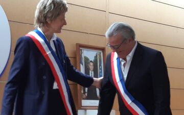 New mayor removes dedicated bike lane, forcing cyclists to share road with cars.