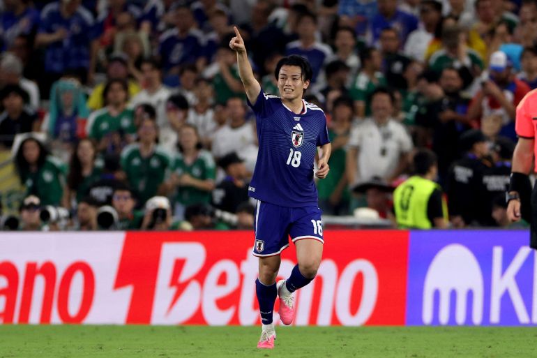 Japan beats Tunisia 4-0 to secure Round of 32 spot