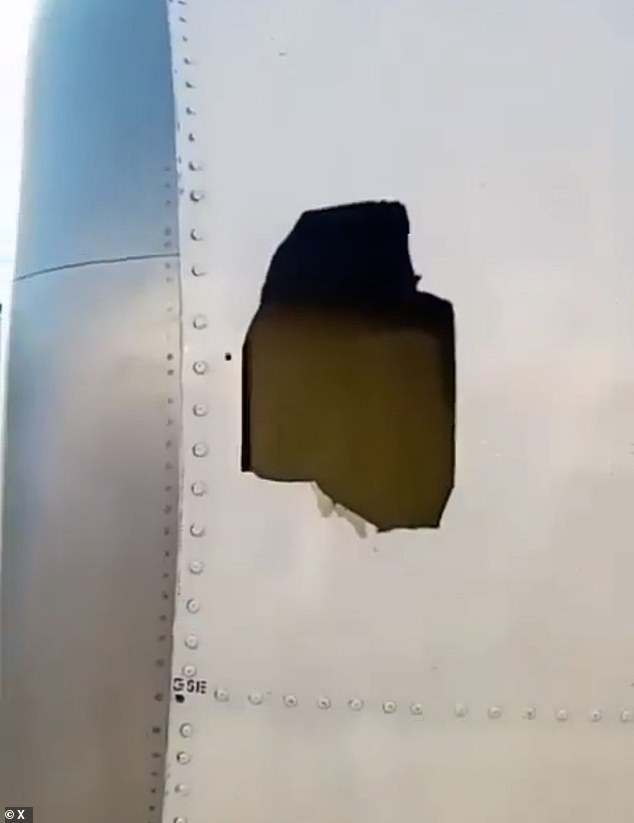 Wife saves husband dangling 20,000 feet by holding on as he falls out of plane window after cabin depressurization incident forces Ryanair flight passengers into emergency rescue operation over Eur...