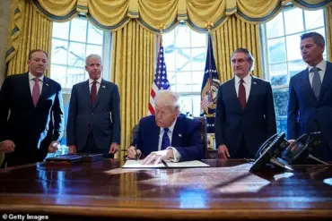 Trump signs executive order threatening loss of funding for states with Covid-19 vaccine mandates