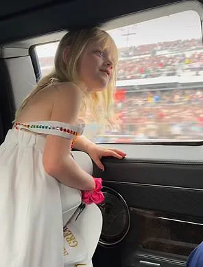 Trump's granddaughter waves at crowd from presidential limousine during Daytona 500