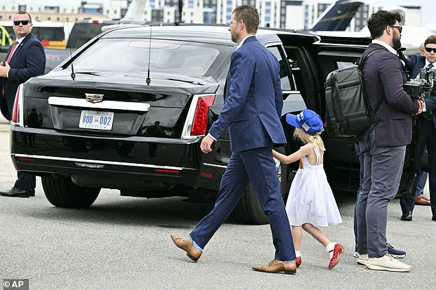 Trump's granddaughter waves at crowd from presidential limousine during Daytona 500