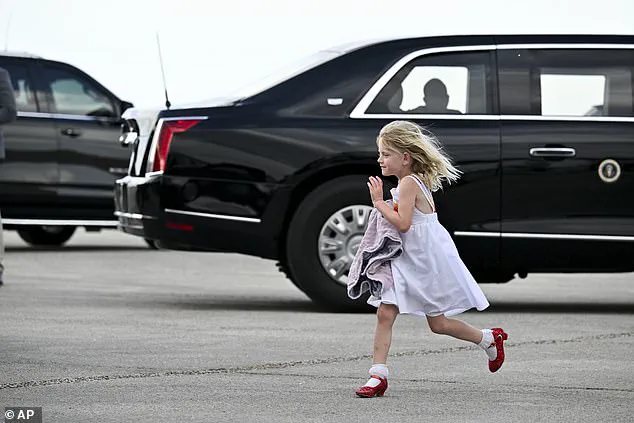 Trump's granddaughter waves at crowd from presidential limousine during Daytona 500