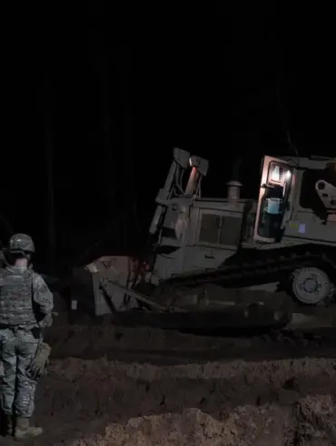 American Soldiers Engaged in Risky Rescue Mission for Stuck Armored Personnel Carrier Near Belarus Border