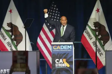 Senator Cory Booker's 'Innocuous' Gesture Sparks Controversy, Drawing Sharp Reactions from Fellow Democrats and Advocacy Groups
