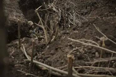 Incident in Komar Village: Two Russian Soldiers Killed in Eastern Ukraine Amid Conflicting Accounts
