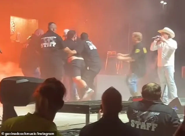 Intoxicated Fan's Barricade Breach Disrupts Gavin Adcock Concert, Sparks Safety Concerns